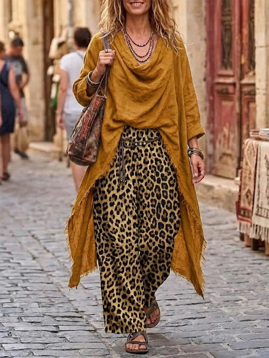 Two-piece Set Featuring An Asymmetrical Cowl-neck Top And Leopard-print Casual Trousers.